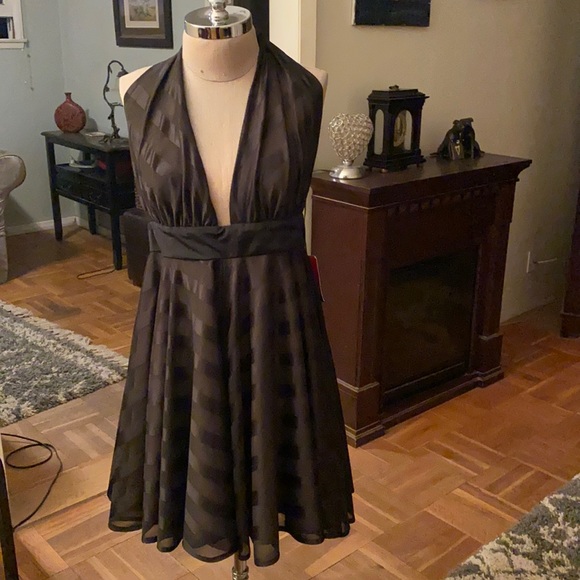 Unique Vintage Dresses & Skirts - NWT Unique Vintage brand dress with an open back